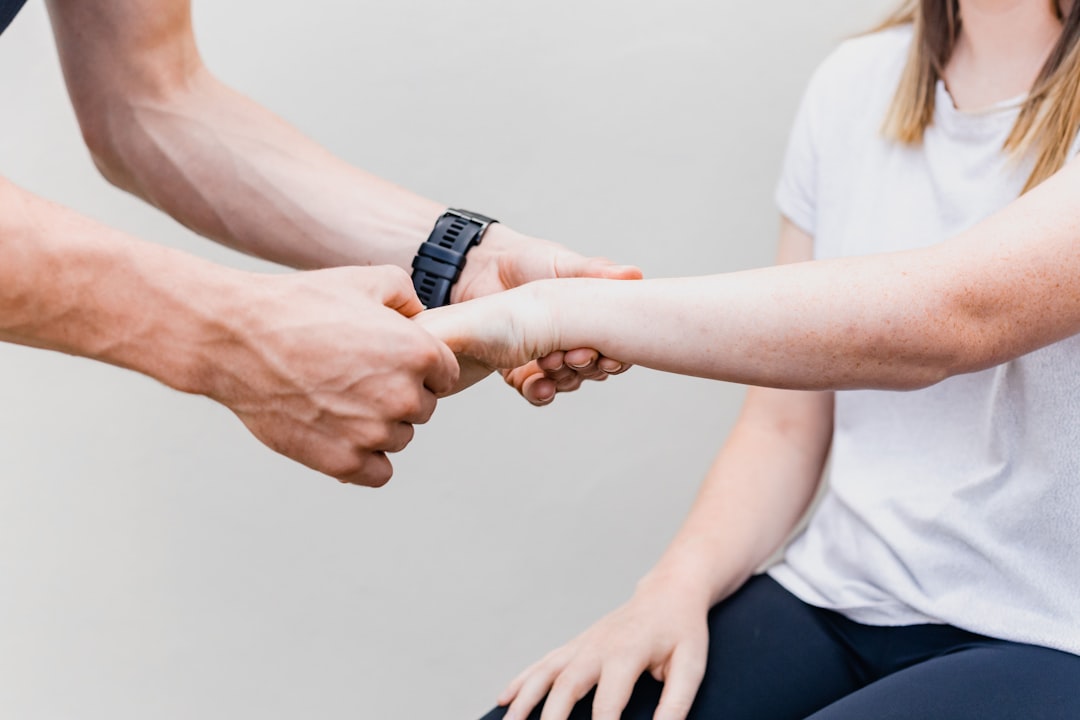Home a-couple-of-people-that-are-holding-hands-qzmpdjjoz4c